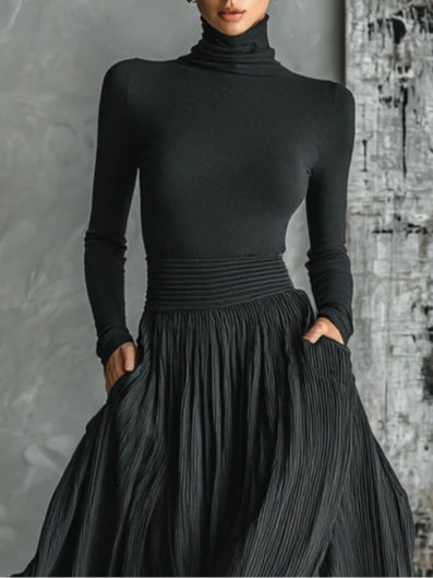 Cybele™ | Completo nero con dolcevita e gonna plissettata